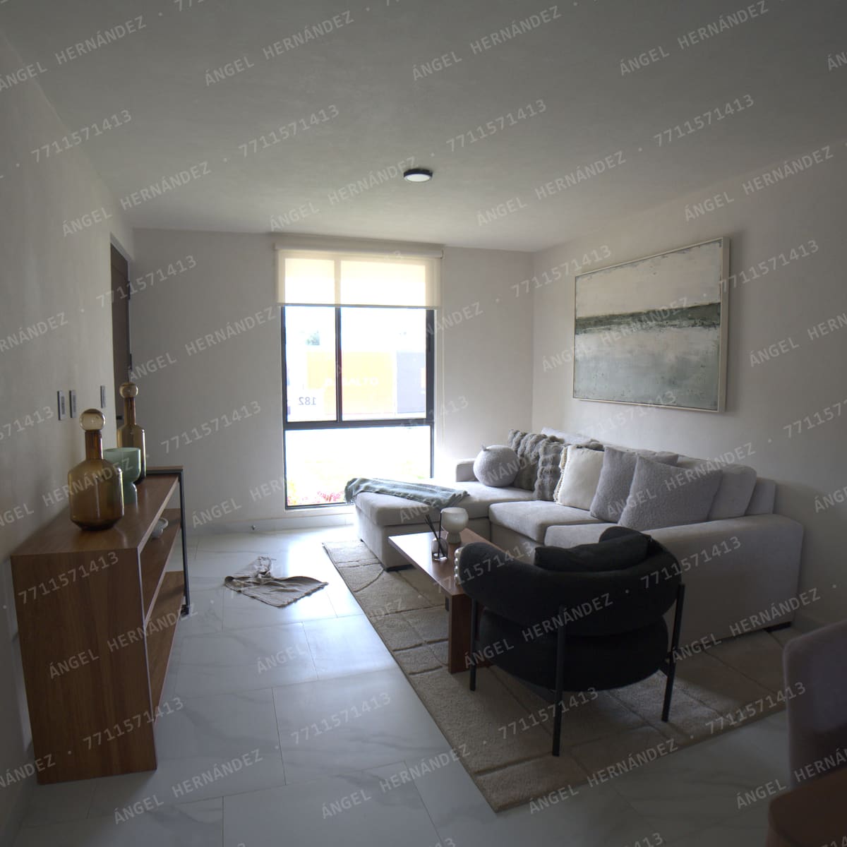 Sala con ventanal en Creta Planta Baja, Basalto