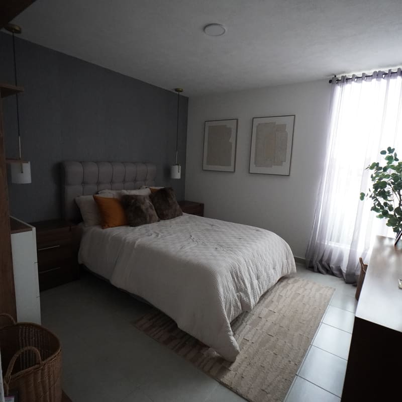 Recámara junior con cama matrimonial y cabecera capitonada en modelo Marsella